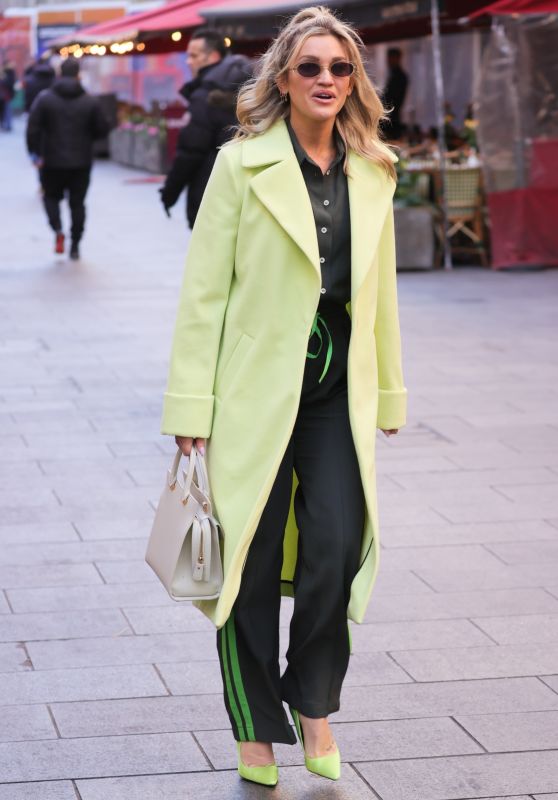 Ashley Roberts in a Lime Green Trench Coat and Striped Trousers ...