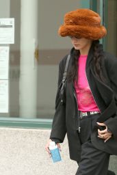 Bella Hadid in Leopard Print Shoes, Pink Shirt and Fuzzy Hat - New York 11/22/2021