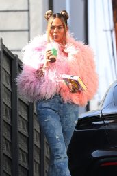 Chrissy Teigen Wears a Pink Feathered Sweater and Blue Jeans - Los Angeles 11/09/2021