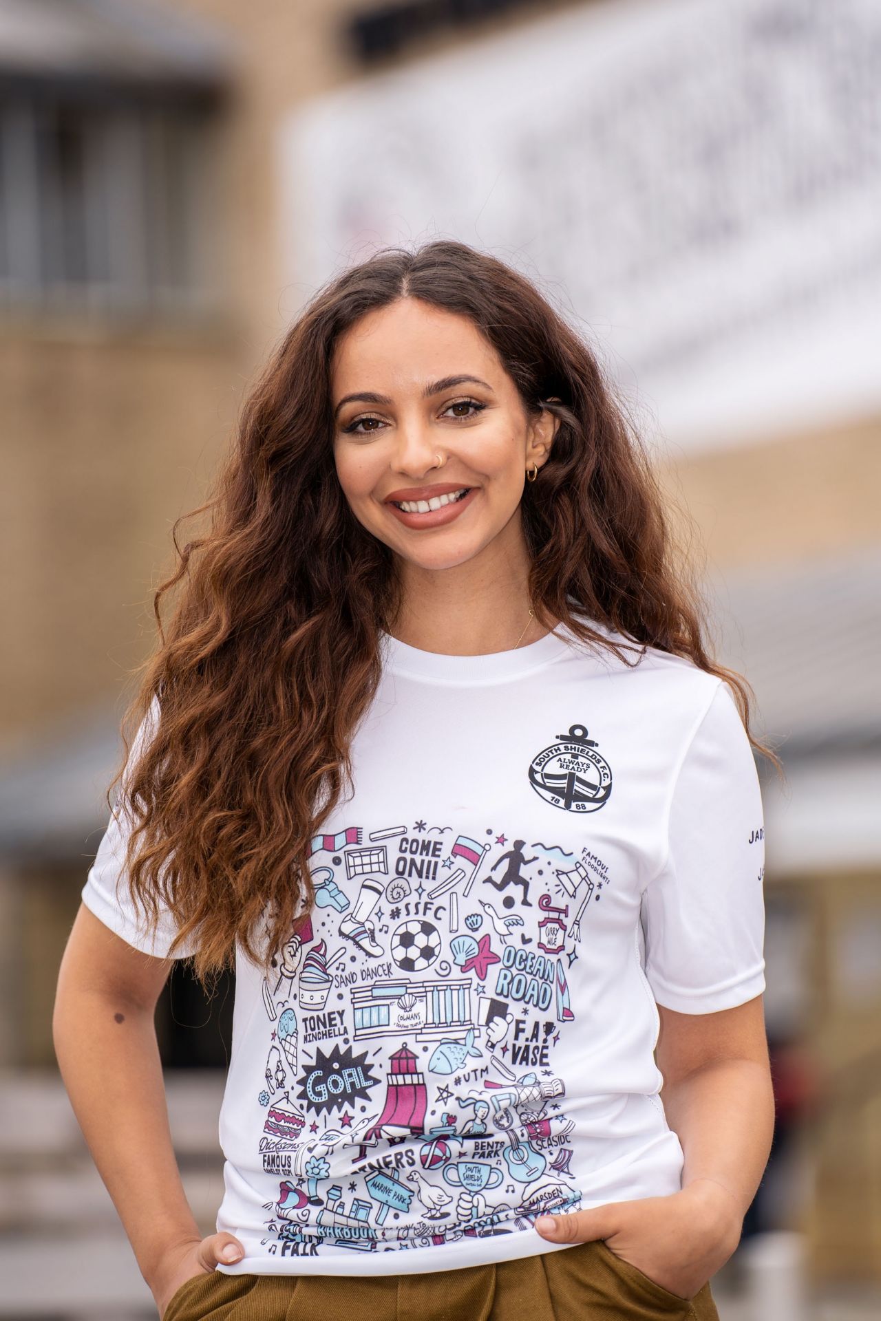 Jade Thirlwall - Posing in Her Limited Edition Community Shirt for