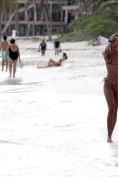 Laura Harrier in a Leopard Print Bikini on the Beach in Mexico 11/16/2021