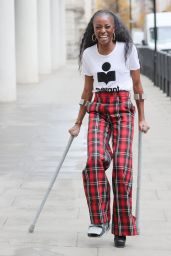 AJ Odudu in Tartan Trousers and Isabel Marant T-shirt - London 12/20/2021