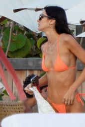 Bella Bamos in an Orange Bikini - St. Barts 12/20/2021