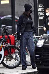 Bella Hadid Wears a Yankees Pendant, Dark Polo Sports Jacket and Matching Blue Pants - New York 12/31/2021