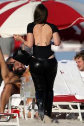 Julia Fox in a Black Cutout Swimsuit - Beach in Miami 01/02/2022
