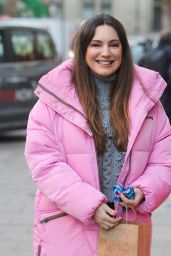 Kelly Brook in a Playful Bubblegum Pink Coat and Prada Loafers - London 01/12/2022