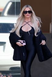 Khloe Kardashian in a Black Catsuit - Burbank 02/10/2022