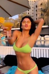 Nicole Scherzinger in a Green Bikini 12/18/2021