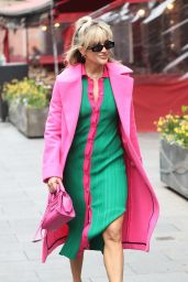Ashley Roberts Wearing a Colourful Dress and Pink Coat - London 03/29/2022