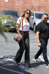 Jennifer Lopez in Black Denim Flare Pants and a White T-Shirt - Los Angeles 03/26/2022