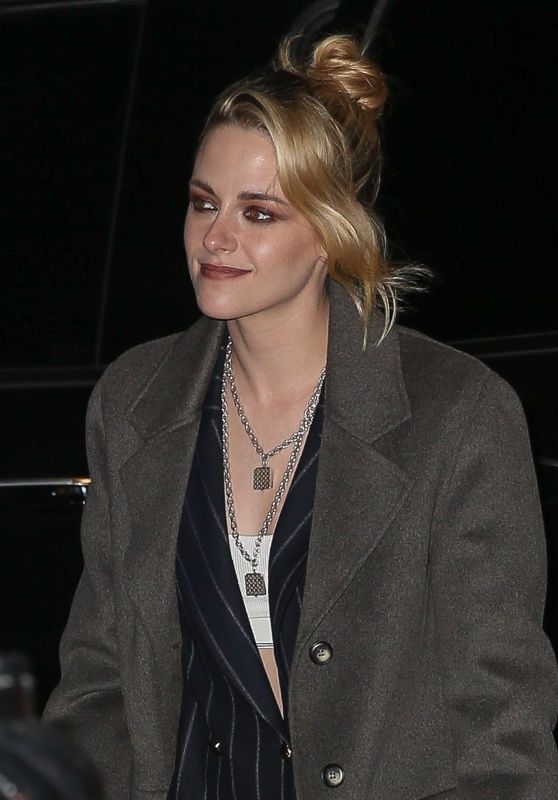 Kristen Stewart Wears a Black Pinstripe Suit and Overcoat - New York 03/10/2022