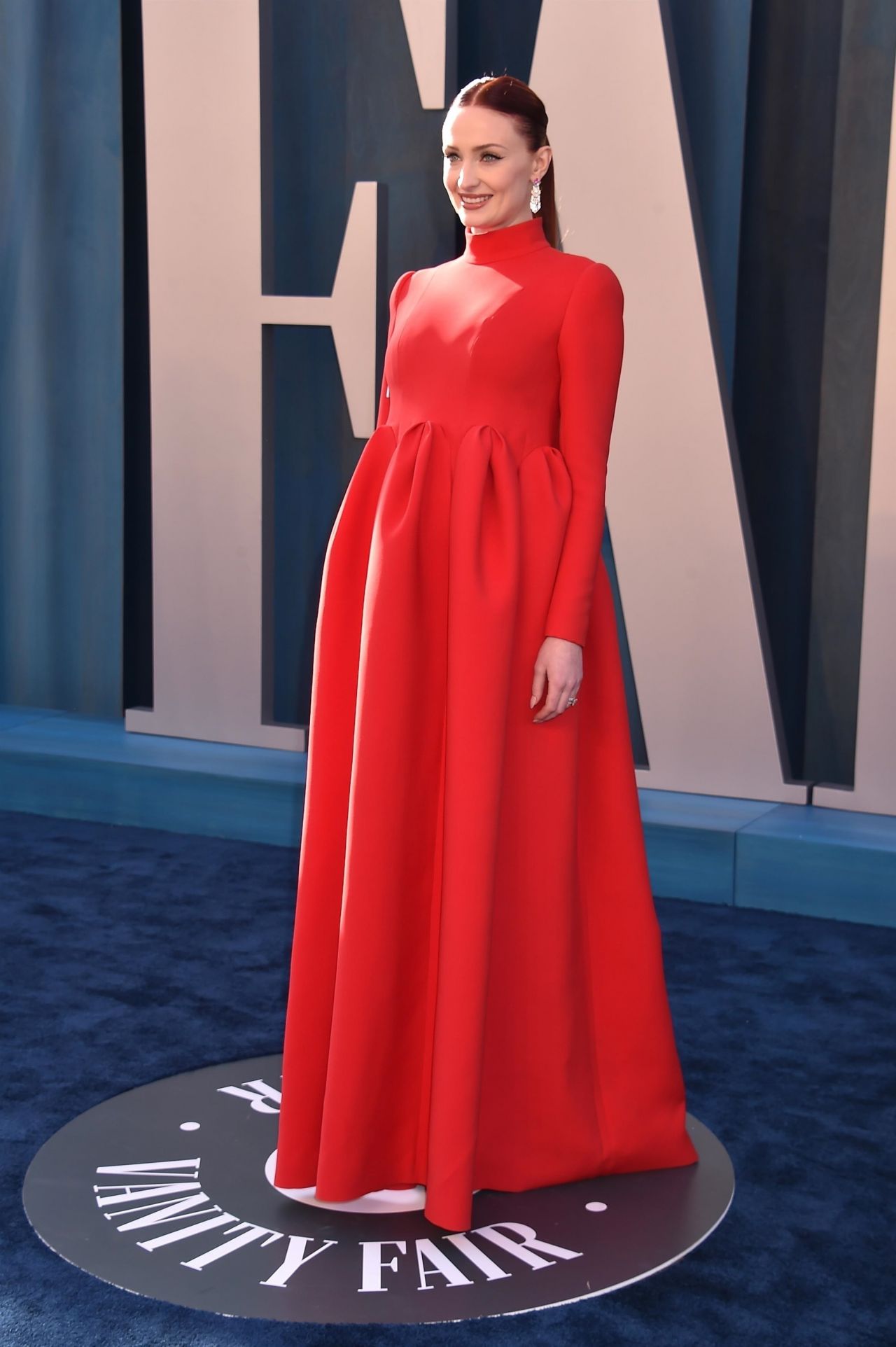 Sophie Turner Sparkles in Sheer Dress at Vanity Fair Oscars Party 2023 –  Footwear News