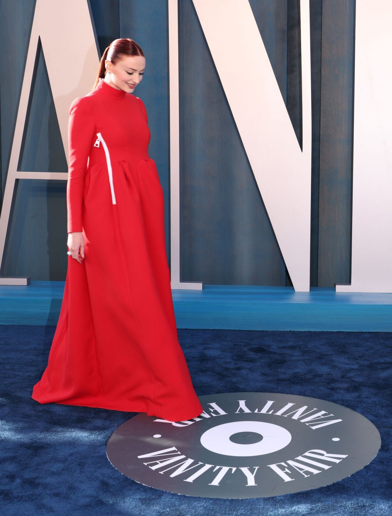 Sophie Turner Sparkles in Sheer Dress at Vanity Fair Oscars Party 2023 –  Footwear News
