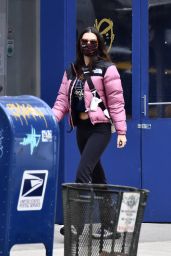 Emily Ratajkowski Wears North Face Nuptse Jacket and a Prada Bag - New York 03/30/2022