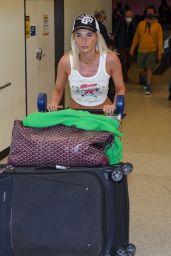 Megan McKenna in Green - Arriving at LAX in LA 04/07/2022