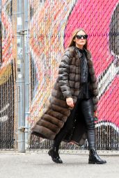 Olivia Palermo Wearing a Black Leather Ensemble With a Long Fur Down Vest and Black Sunglasses 04/26/2022