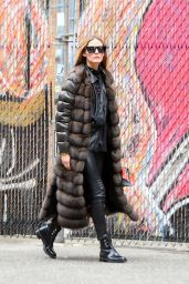 Olivia Palermo Wearing a Black Leather Ensemble With a Long Fur Down Vest and Black Sunglasses 04/26/2022