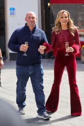 Amanda Holden in a Sparkling Ruby Top and Red Trousers in London 05/27/2022