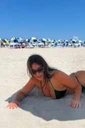 Claudia Romani in a Green Satin Bikini - Miami 05/15/2022