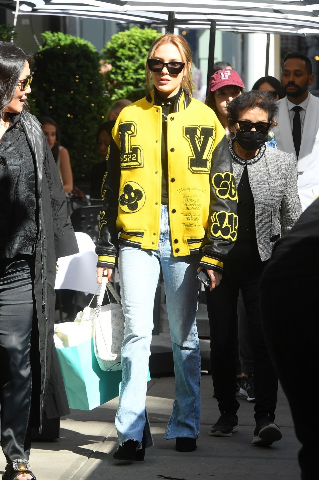 Eileen Gu in a Bright Yellow Louis Vuitton Jacket - New York 04/30/2022 •  CelebMafia