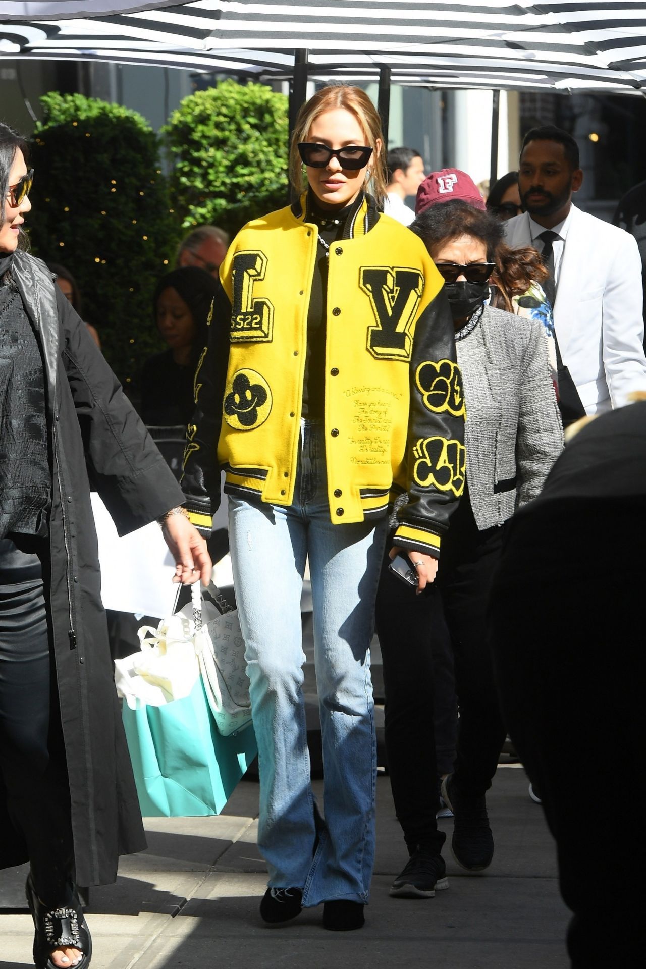 Eileen Gu in a Bright Yellow Louis Vuitton Jacket - New York 04/30/2022 •  CelebMafia