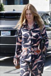 Ellen Pompeo is Stylish in a Black and Pink-Patterned Ensemble 05/08/2022