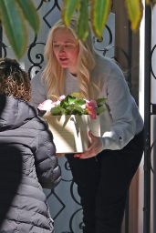 Erika Jayne - Picks Up a Flower Delivery Outside Her Home in LA 05/11/2022