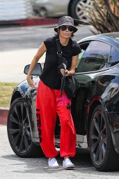 Lisa Rinna in a Red Free City Sweat Pants and Bucket Hat - Cafe Vida in Pacific Palisades 05/16/2022
