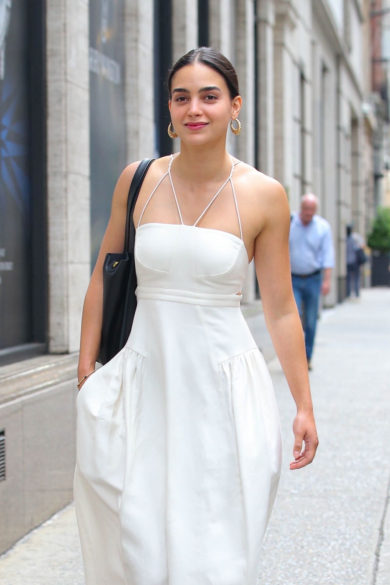 Melissa Barrera in a White Dress and Black Leather Boots - New York 05