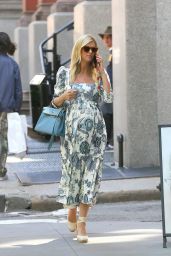 Nicky Hilton Wears a Spring Dress and Matching Tote - New York 05/12/2022