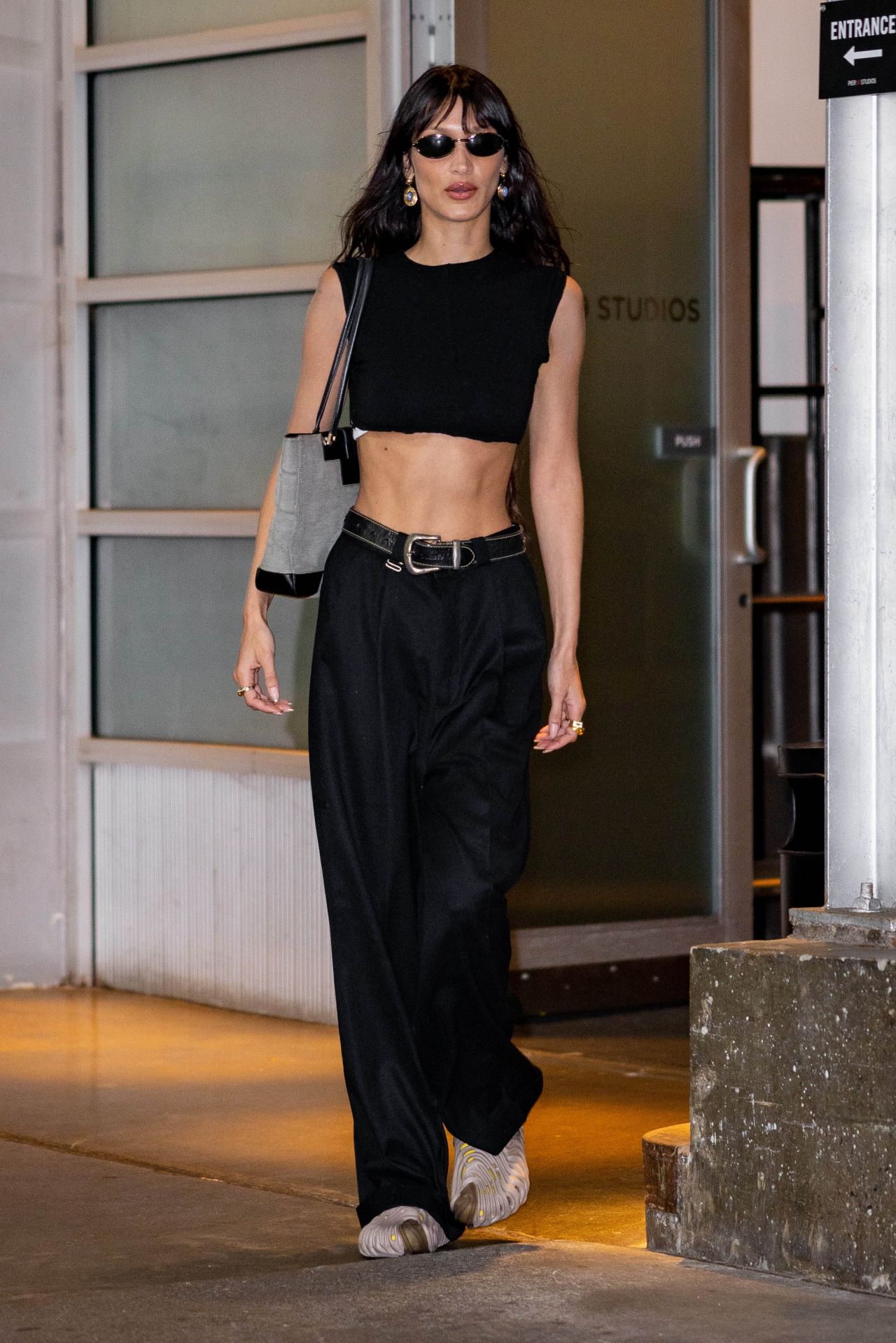 Bella Hadid in High Waisted Trousers and a Black Crop Top - New York 06 ...
