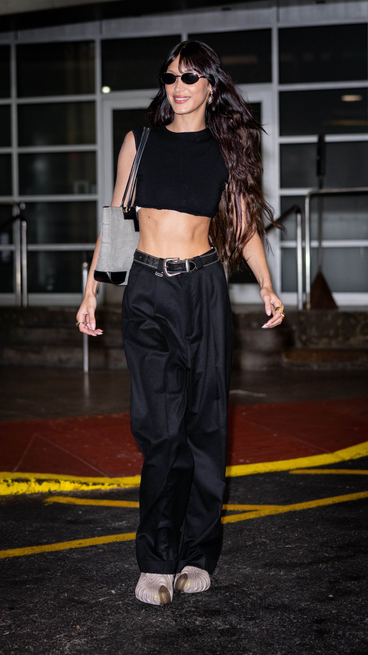 Bella Hadid in High Waisted Trousers and a Black Crop Top - New York 06 ...