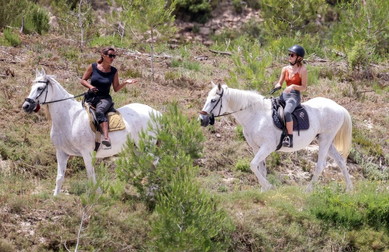 EMMA WATSON Riding a Horse in Ibiza