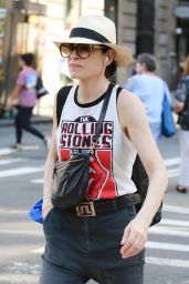 Julianna Margulies in a The Rolling Stones Tank Top and Fedora Hat - Shopping at Manhattan’s Soho Area 06/13/2022