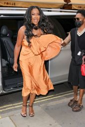 Kenya Moore Wearing a Bright Orange Dress - London 06/28/2022