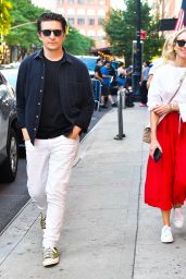 Naomi Watts in a White Sweater and Bright Red Skirt - New York 06/14/2022