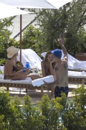 Rita Ora in Floral Bikini by the Pool in Madrid 06/18/2022