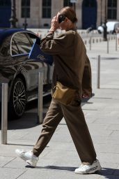 Amber Valletta Wearing Loewe Bag and Off-White Sneakers - Leaving Hotel Ritz in Paris 07/04/2022