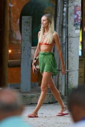 Candice Swanepoel in an Orange Bikini and Green Skirt - Trancoso 07/15/2022