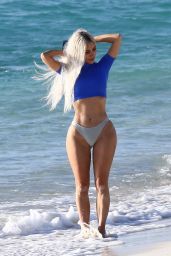 Kim Kardashian "Slipped into a sporty two-piece with a cobalt top and white bottom in Turks and Caicos" (12.07.2022) 6x