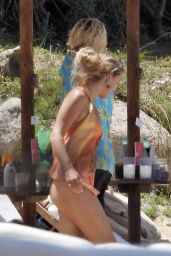 Millie Bobby Brown at a Beach in Sardinia 07/10/2022