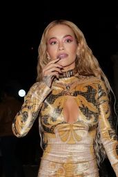 Rita Ora in a Metallic Gold Dress - London 07/01/2022