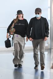 Suki Waterhouse and Robert Pattinson - JFK Airport in New York 07/19/2022