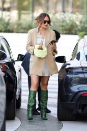 Chrissy Teigen in a Beige Blazer and Green Boots - Beverly Hills 08/18/2022