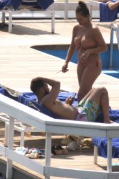 Chrissy Teigen in a Bikini in Villa d