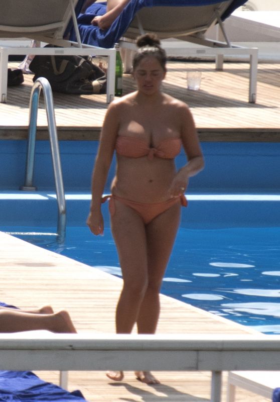 Chrissy Teigen in a Bikini in Villa d'Este Lake Como 08/28/2022 * Cele...