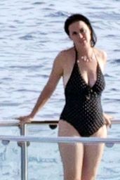 Katy Perry in a Black Swimsuit in Positano 08/23/2022