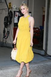 Maria Bakalova Wears a Mustard Yellow Halter Dress in New York 08/03/2022