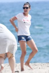 Mila Kunis - Wearing a T-Shirt "Girls Kick Ass" in Santa Barbara 08/11/2022
