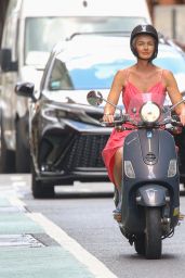 Paulina Porizkova - Riding Her Scooter in New York 08/09/2022